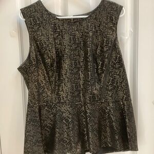 Sleeveless black and shimmery gold peplum top